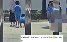 一小学老师疑体罚小女生：老师戴着遮阳帽在旁边看