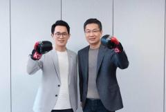 Redmi 重磅新品本月发布 卢伟冰将战斗拳套送给王腾