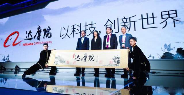 What is the motivation for Alibaba DAMO Academy to release 100 AI patent licenses for free?