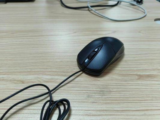 What should I do if my mouse keeps jumping out of control in Windows 11?