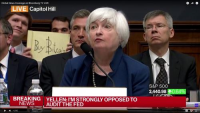 在2017年耶伦演讲中举起的“Buy Bitcoin”标志以100万美元成交