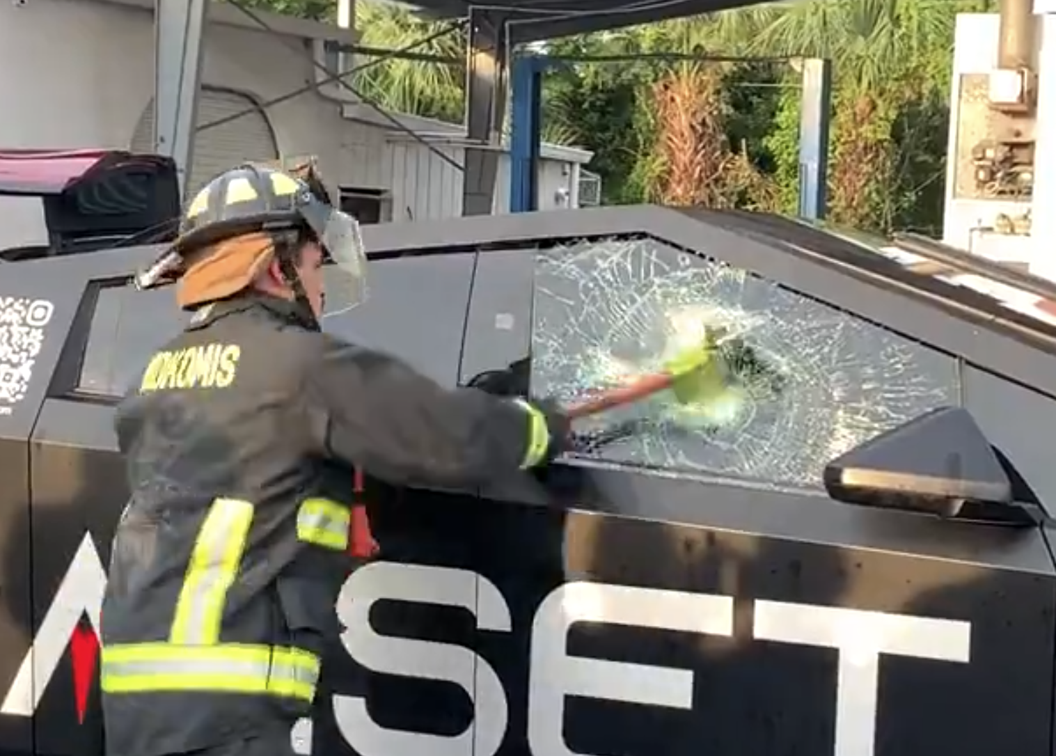 Tesla Cybertruck\'s tough window shatters after twelve blows in latest firefighter demo