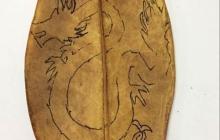 剪出树叶上的中国龙