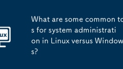 What are some common tools for system administration in Linux versus Windows?