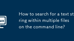 How to search for a text string within multiple files on the command line?