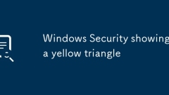 Sécurité Windows montrant un triangle jaune