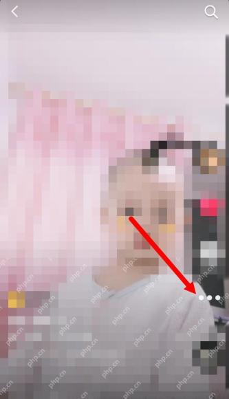 抖音单条作品播放页面用红箭头标出右侧三点菜单，证明进入作品设置的步骤