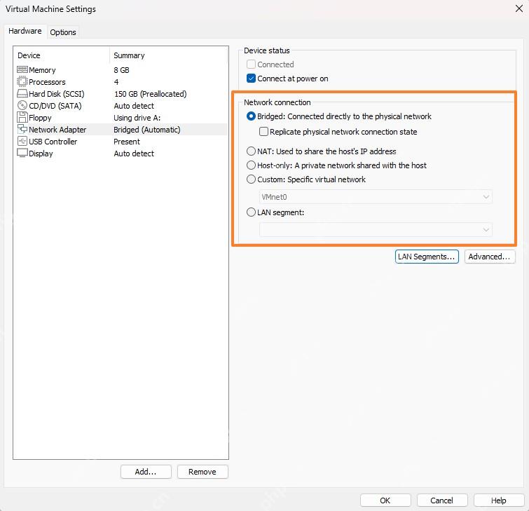 VMware Workstation Virtual Machine Settings 窗口选中 Network Adapter 并显示网络连接模式