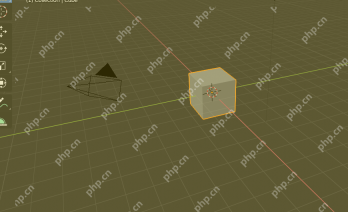 Blender 3D 视图中默认立方体处在网格中心并显示相机和灯光