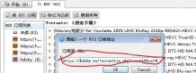 qBittorrent v4.1.6 Windows 中文请输入一个 RSS 订阅地址弹窗，订阅源 URL 输入框和 OK 按钮可见，证明粘贴 RSS 地址并确认
