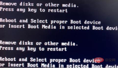 What should I do if my computer cannot boot after removing disk or other media?