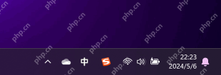 Windows 任务栏托盘区域显示 PixPin 图标和展开箭头，证明关闭开机自启动前通常先从托盘把 PixPin 配置入口找出来